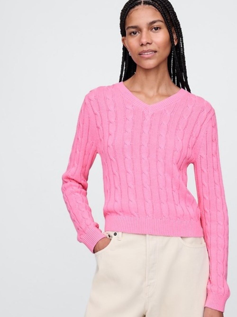 Timeless preppy staple in a vibrant pink. Features a flattering V neck, classic